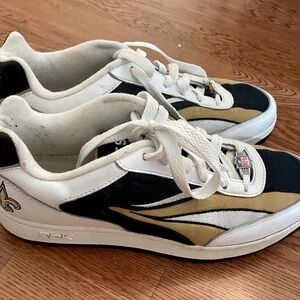 Reebok NFL Saints sneakers.